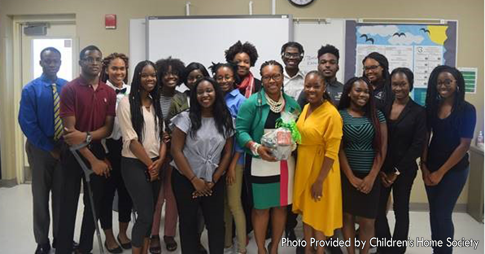 Taken by the Evans Media Department, a group of young high school students gather around Mrs. Tiffany Moore Russell. Evans High school Student Leadership Council had Mrs. Tiffany as their first guest for their Career highlights series. She is the Clerk of Courts for Orange County and was very qualified to speak to the students. She shared her educational background and career path while giving out great advice.