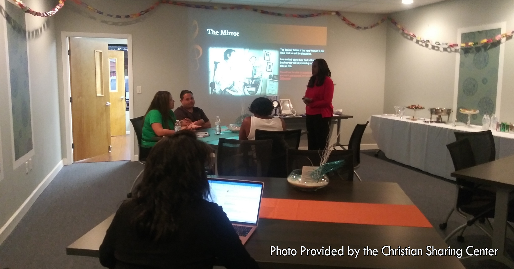 LifeBuilder knows that you cannot reach any point in life that you want without having goals. This photo captures a moment during the Reaching Goals with Purpose class where attendees are learning how to set goals. Yolanda Frazier from Enough is teaching this class the importance of reaching goals.