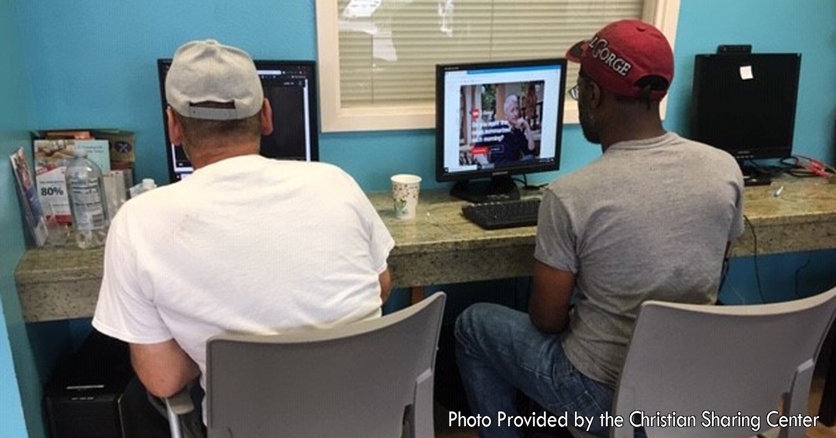 Taken by Wendy Shiner, this photo showcases two of the Oasis clients using desktop computers. Here, clients who do not have access to a computer come to collect their emails and look for job opportunities. The two gentlemen are using every resource to their disposal to create a better future for themselves.