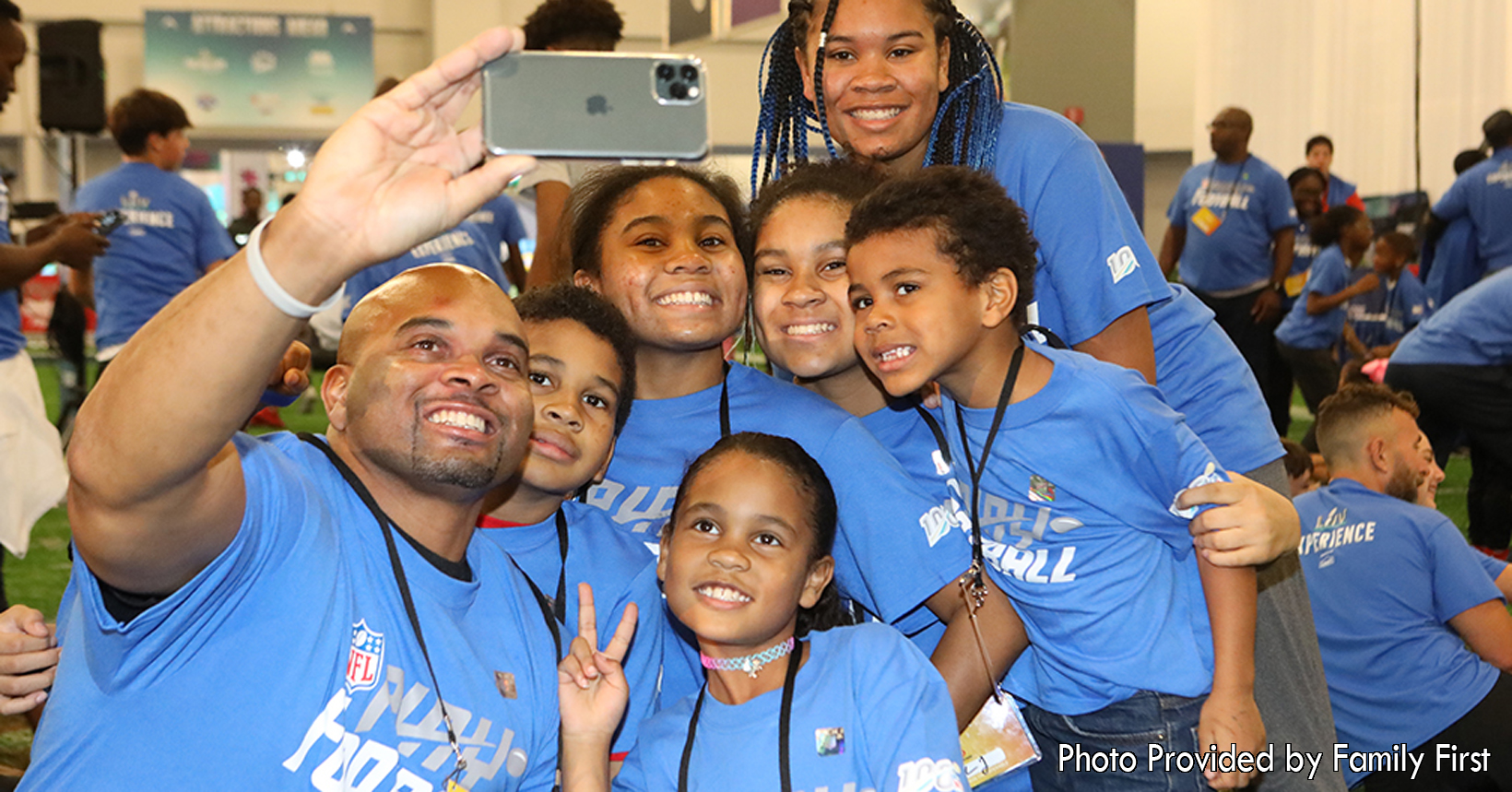 Taken at one of the All Pro Dads events, this young father is getting to know his kids better. Spending valuable time together will help this father and his children build a better and stronger bond.