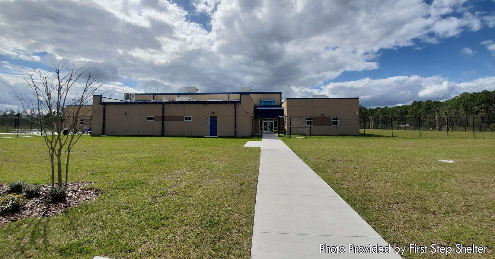 The photo shows the outside of the first step the homeless in Volusia County take to a better life. Upon entering the Shelter Building, they receive food, clothing, shelter, and any medical attention that may be necessary. This is the building that has saved many people before they became self-sufficient.