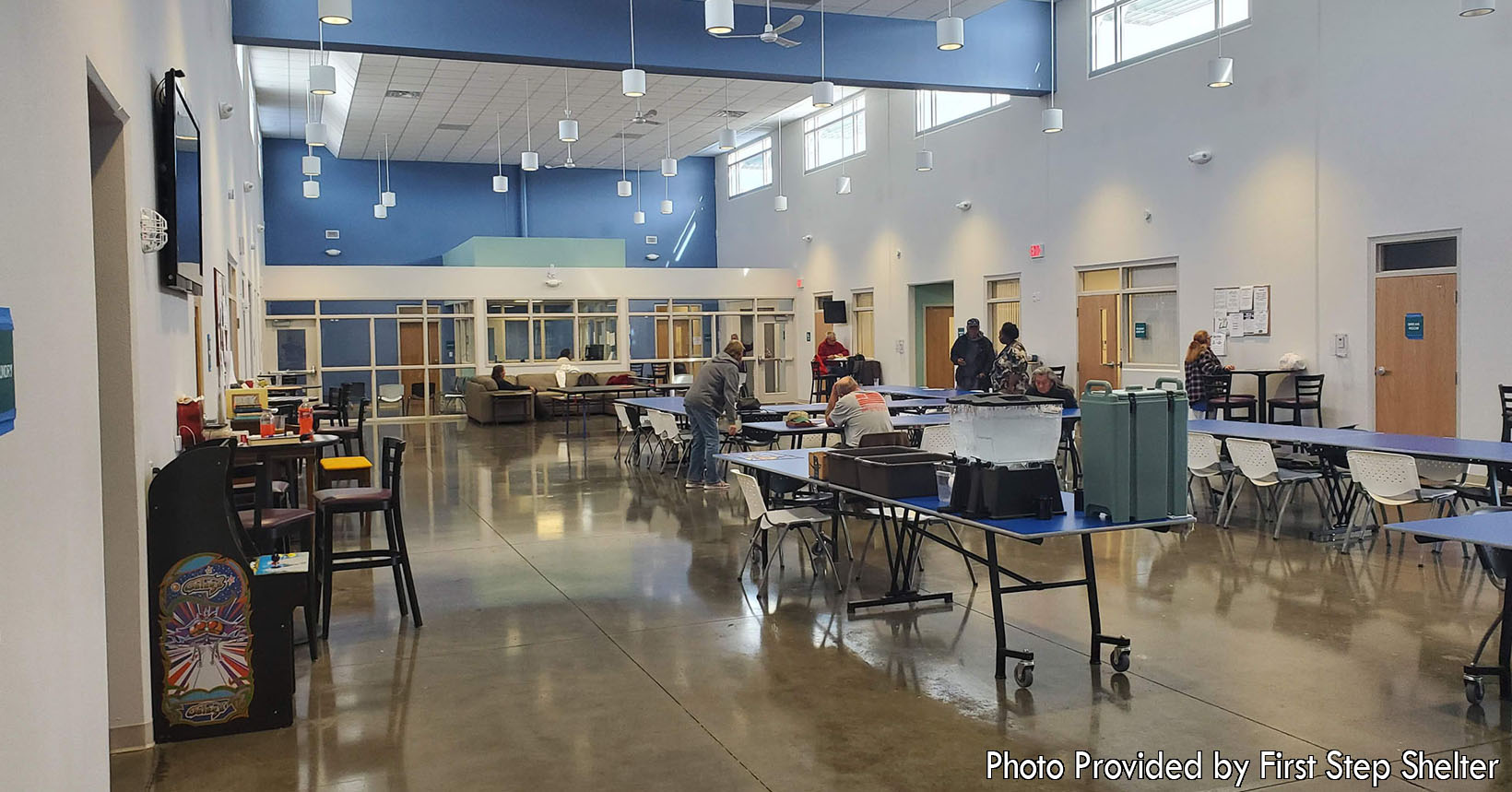 The photo taken shows the common area in the Shelter Building. Here residents do not have to worry about much. They receive their meals, play games such as ping pong, socialize with one another and watch television. If time permits, the residents take naps on the couches.