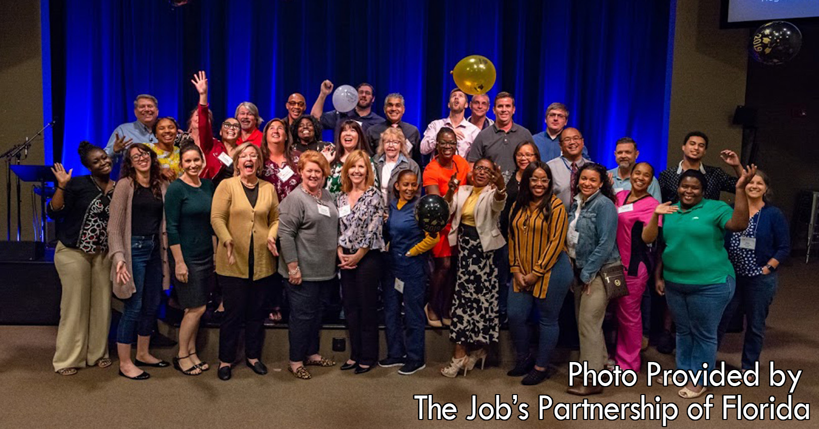 The participants of the Summit Church LifeWorks 12-week program are gathered to celebrate. The group has completed all 12 weeks of the course and are awaiting graduation. Afterwards, they set off to a better and brighter life.